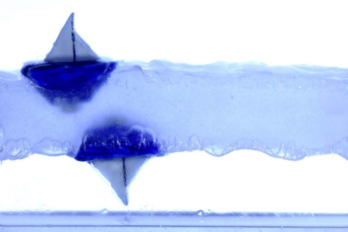 HamaraTimes.com | Watch a toy boat float upside down in a levitating puddle