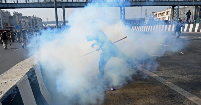 Indian police use tear gas as protesting farmers rally to capital
